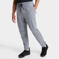 Men's Nike Dri-FIT Unlimited Tapered Leg Versatile Training Pants Smoke Grey/Black/Smoke Grey - FB7548 084
