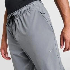 Men's Nike Dri-FIT Unlimited Tapered Leg Versatile Training Pants Smoke Grey/Black/Smoke Grey - FB7548 084 -Deals Adidas Store FB7548 084 M5