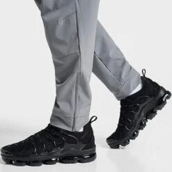 Men's Nike Dri-FIT Unlimited Tapered Leg Versatile Training Pants Smoke Grey/Black/Smoke Grey - FB7548 084 -Deals Adidas Store FB7548 084 M6